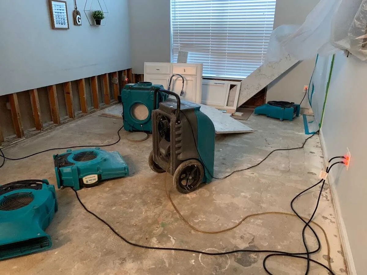 Dehumidifier in flood-cut room for Water Damage Restoration in Taylorsville